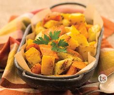 a bowl filled with cooked potatoes on top of a table