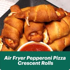 an air fryer pepperoni pizza crescent rolls with ketchup