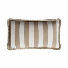 a brown and white striped pillow on a white background