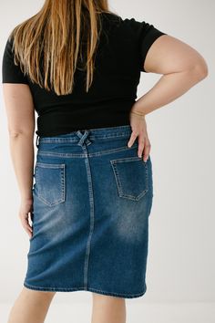 Every modest denim collection needs a classic no-fuss dark wash denim skirt! The 'Scout' denim skirt features a simple design, a modest knee-length, and working pockets for life on the go! The knit denim with belt loops ensures a flattering fit for a variety of body types. Style with a graphic tee and sneakers for an effortless vibe. Perfect for your everyday activities or traveling the world! Exclusively designed by us, for you! 85% Cotton 10% Polyester 5% Spandex Wash Cold Gentle Cycle Hang to Medium Wash Denim Pencil Skirt With Pockets, Dark Wash Denim Pencil Skirt With Pockets, Casual Dark Wash Denim Pencil Skirt, Everyday Dark Wash Bottoms With Pockets, Everyday Dark Wash Denim Skirt, Spring Denim Bottoms For Everyday Use, Denim Bottoms For Everyday Spring Use, Everyday Medium Wash Denim Skirt, High Waist Denim Skirt For Everyday