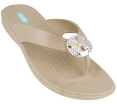 Shimmering in metallic hues, with a silvertone and goldtone sand dollar embellishment, the Sandy thong sandal brings an elegant look to a sporty and comfortable design. From Oka-B. Casual Silver Flip Flops For Beach, Casual Silver Flip Flops For The Beach, Sand Dollar Pendant, Paw Print Jewelry, Spirit Clothing, Fair Trade Jewelry, Ribbon Jewelry, Gold Sand, Printed Jewelry