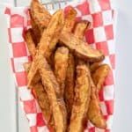 french fries on a red and white checkered paper