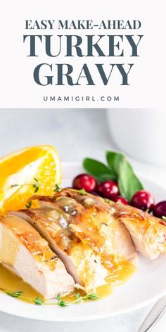 turkey gravy on a white plate with oranges and cranberries