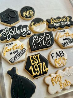 decorated cookies are displayed on a tray for someone's 30th birthday party or special occasion