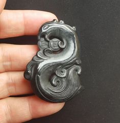 Chinese antiquity dragon phoenix bird Carved Amulet Jade Pendant,1.Material: natural black green jade stone bead, top with pass hole2.Size of bead:approx 54mmx40mmx6mm in size.3. this price is 1pendant.4. fit make earring /brooch/pendant/necklace ect jewelry,5.If you have speical requests, I'll be happy to do it for you.6.Returns:I accept returns.1)Send me an email within 7 days and let me know the item is being returned.2)I will refund your money after we recieve our merchandise.3)Precondition: Black Carved Round Jewelry, Black Dragon Design Jewelry Gift, Black Jade Jewelry With Natural Stones, Black Jewelry With Dragon Design For Gift, Black Spiritual Jewelry With Dragon Design, Spiritual Black Jewelry With Dragon Design, Handmade Black Jade Necklace, Black Carved Symbolic Necklace, Black Symbolic Carved Necklace