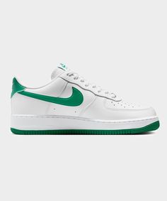 Debuting in 1982 as a basketball must-have, the Air Force 1 came into its own in the 90s. The clean look of the classic white-on-white AF1 was endorsed from the basketball courts to the block and beyond. Finding its rhythm in hip-hop culture, releasing limited collabs and colorways, Air Force 1 became an iconic sneaker around the globe. And with over 2000 iterations of this staple, its impact on fashion, music and sneaker culture can’t be denied. Comfortable, durable and timeless—it’s number 1 for a reason. The ‘80s construction pairs with classic colors for style that tracks whether you’re on court or on the go. Benefits Leather upper softens and gains vintage character with wear. Originally designed for performance hoops, the Nike Air cushioning adds all-day comfort. Padded, low-cut coll White Af1, Basketball Courts, New Nike Air Force, Soccer Shop, White Kicks, Green Sneakers, Wide Width Shoes, A Basketball, Nike Air Force 1 Low