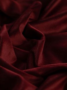 a close up view of a red fabric