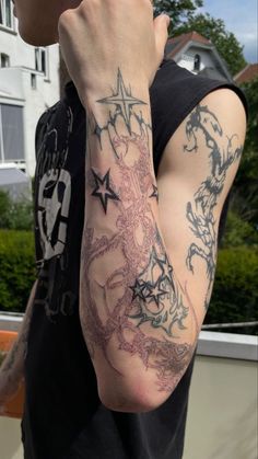 a man with a tattoo on his arm