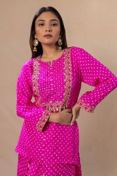 Hot pink bandhani pattern short kurta with hand embroidery detailing. Paired with an inner and bandhani draped dhoti pant. - Aza Fashions Bandhani Pattern, Short Kurta, Dhoti Pants, Pink City, Embroidery Detailing, Pant Set, Pink Silk, Embroidered Silk, Set For Women