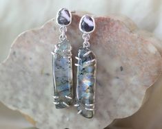 Cobblestone stud dangles featuring uniquely cut flashy labradorite. Earring drop length approximately 2in x 0.3in All sterling silver. Silver Labradorite Gemstone Earrings, Cobble Stone, Sticks And Stones, Valentines Jewelry, Stone Earrings, Stone Necklace, Ring Earrings, Labradorite, Jewelry Shop