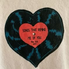 the back of a t - shirt with an image of a heart on it that says, songs that remind me of you