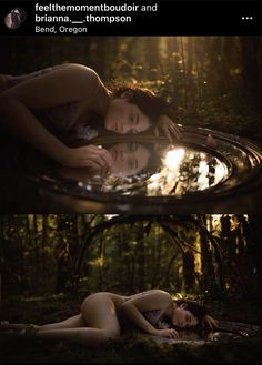 two women laying on the ground next to each other in front of trees and water