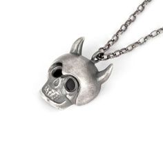 Wonderfully menacing, this flawlessly detailed skull with horns pendant necklace is crafted from solid sterling silver. The hand brushing of the silver combined with the black oxide finish is what gives it this cool antiquated look, as if you just found it in a trunk in the attic. Definitely a gift for the edgy man in your life! The skull pendant hangs from a 28inc  link sterling silver link chain that slips over their head, but I can make it in any chain length. Necklace comes in a handsome bla Skull With Horns, Horn Pendant Necklace, Mens Cross Necklace, Silver Link Chain, Mens Gold Jewelry, Mens Bracelet Silver, Horn Pendant, Necklace Men, Length Necklace