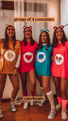 group of four women dressed up in costumes