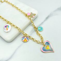 18k Gold Filled 6mm Rolo Chain & Colorful Enamel Cute Charms, Heart, Shell, CZ Teddy Bear, Guiding Star, Lollipop, Wholesale Jewelry Necklace Size: - Length: 21 inches + 3.3 inches extender | Thickness: 6mm Charms Size: - Heart: 25mm  - Shell: 12mm x 15mm  - Bear: 20mm x 13mm - Lollipop Pearl: 21mm x 15mm - Guiding Star: 13mm 💎 With new products daily, quality and competitive  prices, in DiJu Jewelry you find the most unique styles of modern designs, always looking for elegance and market trends.   *Helping your Jewelry Businesses Grow *Starting your Own Business *Making your Own Collection: DiJu Jewelry ever brings Better Moments for your Life.   📲 Find many more styles in our DiJu Jewelry Etsy Store. https://www.etsy.com/shop/DJDiJuJewelry   💎 You can choose from unique styles of earr Playful Heart-shaped Gold Jewelry, Multicolor Heart Charm Necklace For Gift, Multicolor Heart Charm Necklace As Gift, Personalized Multicolor Charm Necklaces For Valentine's Day, Personalized Multicolor Charm Necklace For Valentine's Day, Playful Gold Jewelry With Heart Beads, Cute Charms, Solid Gold Jewelry, Rolo Chain