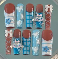 Winter Cinnamoroll set ❄️⛄️🐶 I’m loving all these custom winter sets, keep them coming!! 🤍
.
Recreation of @thesavvyashcheeks 
.
.
.
#pressonnails #bluenails #frenchtip #coquettenails #sanrionails #charmnails #heartnails #auranails Cinnamoroll Nails, Design