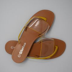 A summer sandal that's on trend and oh so cute. Mustard yellow is always poppin' and the clear strap trimmed in mustard with a diagonal mustard strap. Size Guide Note these run a half size big. I normally wear a 7 and can fit a 6.5.***Final Sale no returns or exchanges*** Sandals Summer, Mustard Yellow, Final Sale, Size Guide, So Cute, Mustard, Running, Sandals, Yellow