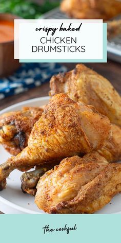 crispy baked chicken drumsticks on a white plate