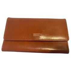 Vintage Rolfs Brown Leather Organizer/Wallet. Well Designed Organizer Wallet Is Crafted Of Smooth Brown Quality Leather. Includes Custom Size Note Pad With Pull Out, Tear Away Tabs. Sections For Credit Cards, Id Window, Passport, Notes/Bills. Attractive Compact Organizer That Has Never Been Used - Excellent Vintage Condition. Approximate Measurements:4” Width.7” Height,1/2” Depth. Materials: Genuine Leather. Brand: Rolfs. Made In The Usa. All Measurements Are Approximate(Measurements Taken Flat). Please See All Photos As They Also Serve As Part Of The Description. If Any Questions, Don’t Hesitate To Ask. -All Reasonable Offers Are Welcome -No Trades, Sorry. Elegant Cognac Wallet For Travel, Elegant Cognac Wallet, Elegant Everyday Brown Wallet, Leather Organizer, Leather Organization, Wallet Organization, Credit Cards, Note Pad, Wellness Design