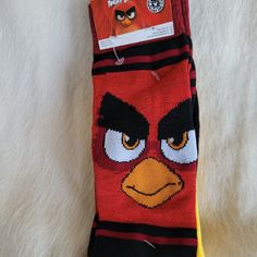 Brand New. Set Of 2. Angry Birds. Fits Shoe Sizes 6-12 Fun Red Socks For Gifts, Fun Yellow Cotton Socks, Fun Cotton Winter Socks, Fun Winter Cotton Socks, Playful Red Cotton Socks, Casual Yellow Socks For Stocking Stuffers, Angry Birds, New Set, Red Yellow