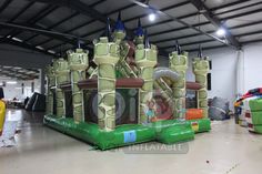 an inflatable castle is set up inside a building