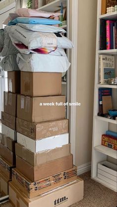 boxes stacked on top of each other in a room