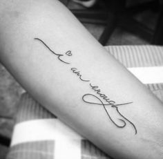 a woman's arm with a tattoo that says, love is forever on it