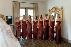 the bride and her bridesmaids are getting ready for their wedding