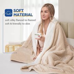 a woman sitting on a bed wrapped in a blanket and holding a remote control with the text soft material soft silky flannel to hand soft & friendly to skin