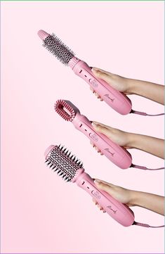 What it is: An interchangeable blow dry brush with one base and three heads.What it does: With one base and three heads, you can dry, smooth and style hair with a single tool. It works like this; dry the roots and any excess water with the pre-styling dryer attachment. Then choose your fighter. The Volume Head oval attachment creates epic curve and bounce for th eultimate salon quality blowout. The Curling Head round curling barrel creates loose curls iwth ease. The detachable design also means Hair Tools Aesthetic, Stylized Photoshoot, Hair Commercial, Blow Brush, Blow Dry Curls, Choose Your Fighter, Fine Flat Hair, Company Ideas, Blow Dry Bar