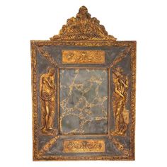 an ornate gold frame with figures on it