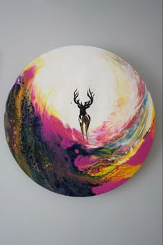 an artistically painted bowl with a deer on it