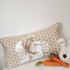 "White Bunny on Beige and Pink Designer Fabric Hand-painted Pillow Cover Get ready for spring and Easter decorating.  This hand-painted Easter lumbar pillow cover is made of a decorative fabric front with a canvas back. Easy accessible beige canvas back overlaps to fit pillow insert.  Insert is not included.   Designed to fit a 12\" x 22\" insert.  Insert is not included.  **NOTE** This listing is for the pillow cover ONLY.  If using outside, we suggest spraying with a fabric protector.  Made ii Bunny Throw Pillow, Accessible Beige, Lumbar Pillow Cover, Etsy Pillow Covers, Fabric Decor, Lumbar Pillow, Pillow Inserts, Throw Cushions, Fabric Design