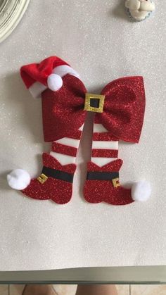 a pair of christmas stockings sitting on top of a table