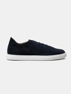 The Sneaker 02 - Navy Suede is our minimalistic sneaker designed with sleek, sharp and low lines. Crafted from high-quality leather with a sewn-on rubber sole. Perfect for creating crisp city-smart looks with your favourite pair of denims. Modern Custom Suede Sneakers With Stitched Sole, Modern Custom Sneakers With Leather Sole For Everyday, Modern High-top Sneakers With Stitched Sole, Modern Custom Sneakers With Plain Toe For Everyday, Modern Everyday Custom Sneakers With Plain Toe, Modern Custom Sneakers With Stitched Sole For Everyday, Modern Custom Sneakers With Gum Sole And Plain Toe, Modern Custom Sneakers With White And Gum Sole, Modern Custom Sneakers With Stitched Sole