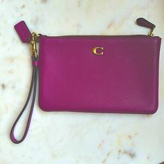 Coach Clutch/Wristlet. Brand New. Received As A Gift And Never Used. Classic And Timeless. Coach Everyday Bags With Wrist Strap, Everyday Coach Bags With Wrist Strap, Purple Clutch Wristlet For Everyday Use, Coach Clutch With Removable Pouch For Everyday, Everyday Coach Clutch Wristlet, Coach Clutch With Wrist Strap For Everyday Use, Everyday Coach Clutch With Wrist Strap, Chic Coach Wristlet For Everyday Use, Coach Clutch