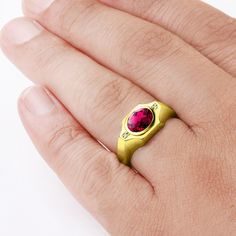 Make a statement with this delicate solitaire ring, featuring a rich ruby gemstone complimented by sparkling diamonds and framed in 10k yellow gold.Metal:10K Yellow GoldRuby: carat total weight - 2.400.7cm x 0.9cmsetting - bezel settingDiamonds:carat total weight - 0.02color - Hclarity - VS1setting - pave setting Ruby Ring Set, Yellow Gold Mens Rings, Gold Finger Rings, All Gems, Sterling Silver Engagement Rings, Ruby Stone, Men Diamond Ring, Pave Setting, Ruby Gemstone