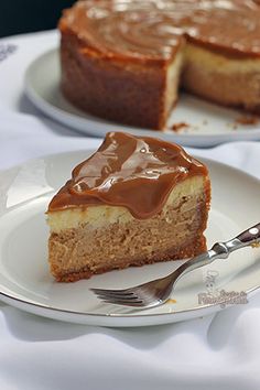 there is a piece of cake on the plate and another slice has been cut out