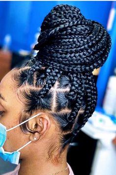 Chic and Easy Scarf Hair Ideas Big Box Braids In A Bun, Big Box Braids Hairstyles Updo, Braid Hairstyles For Natural Black Hair, Box Braids For Black Women Medium, Braid Buns Hairstyles For Black Women, Four Braids Hairstyles Black Women, Jumbo Box Braids In A Bun, Cool Cornrows For Black Women, 2023 Knotless Braid Styles