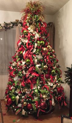 a christmas tree decorated with red and green ornaments