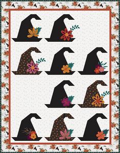 a quilt pattern with witches hats and flowers on the front, in different sizes and colors