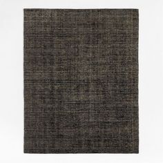 an area rug with black and grey colors