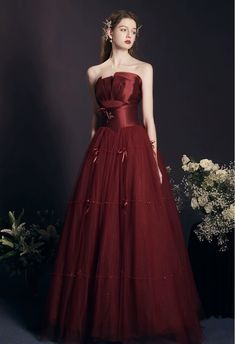 Red Bridesmaid dresses, fairy dress, long red dress, strapless evening gownMaterial:tulleColor:as picture or custom colorNeckline:straplessBack details:bandageDress type:A-lineStyle:fairy&ltp&gtFeatures:bead&lt/p&gt&ltbr/&gt&ltp&gtThis dress could be custom made, there are no extra cost to do custom size and color.&lt/p&gt&ltbr/&gt&ltp&gt1, If the color is customized, please note the color & card number.&lt/p&gt&ltbr/&gt&ltp&gt2,You can choose standard size or custom size . If dress is custom ma Strapless Tulle Dress With Sweep Train, Strapless Tulle Gown For Banquet, Strapless Ball Gown For Prom, Strapless Tulle Evening Dress For Banquet, Red Gown With Corset Back For Prom, Strapless Tulle Evening Dress With Sweep Train, Red Prom Evening Dress With Corset Back, Red Evening Dress With Corset Back For Prom, Strapless Tulle Dress For Banquet