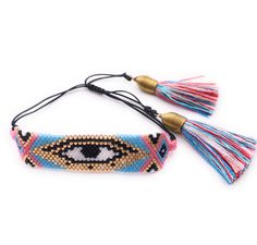 "Boho Bracelets for Women Details: Handmade Woven Bracelet Adjustable from 5\" inches to 10\" inches Dimensions: 3.5\" x 0.75\" or 8.5 cm x 1.8 cm 2\" Multicolor Silk Tassels. The tassels are wrapped with brass wire. This is a trendy piece to wear alone or with other bracelets. Each item is carefully shipped in a beautiful organza pouch, bubble wrapped and well protected." Bohemian Adjustable Hand-strung Evil Eye Bracelet, Bohemian Multicolor Tassel Bracelets, Adjustable Beaded Bracelets With Tassels For Beach, Adjustable Bohemian Friendship Bracelets With Tassels, Multicolor Bohemian Evil Eye Bracelet For Festivals, Bohemian Multicolor Evil Eye Bracelet For Festivals, Adjustable Fringe Jewelry For Festivals, Bohemian Tassel Bracelet, Adjustable Beaded Bracelets With Tassels For Festivals