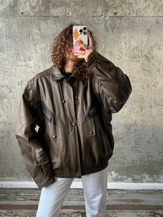 "Vintage 90s leather motorcycle bomber jacket in brown, loose/oversized fit, grunge style, 100% genuine leather, fits XS-M, polyester lining, button & zip closure, with detachable sleeves, perfect condition  Measurements  Shoulders 50 cm / 19.7\" Sleeve 68 cm / 26.8\" Length 75 cm / 29.5\" Bust 62 cm / 24.4\" Model's height 166 cm / 65.4\"" Oversize Style, Leather Fits, Detachable Sleeves, Grunge Style, Grunge Fashion, Vintage 90s, Brown Leather, Bomber Jacket, Genuine Leather