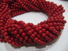 Beautiful Red Coral Round Shape Beads Plain Smooth Ball Shape Red Coral Beads Size 6-7mm Sold per Strand 15-16 inch Long Wholesale Price Precious Stones Size : 6-7mm Color: Red Shape : Round These are top Quality Gemstone Beads . Measurements and weight are close approximations. Great Quality for making Necklace, earrings, Bracelet or any other jewelry. The photographs of the items have been taken in natural daylight, without any enhancements or affects and all attempts have been made to depict Red Coral Gemstone Beaded Bracelets, Red Gemstone Beaded Bracelets, Red Coral Beaded Bracelets With Round Beads, Gift Red Coral Round Beads, Gift-grade Red Coral Beads, Red Coral Spacer Beads, Round Shape, Red Coral Round Spacer Beads, Red Coral Spacer Beads, India Gift