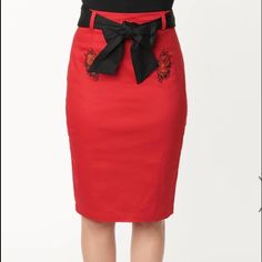 Sultry Pencil Skirt Crafted In Red Cotton With A Dash Of Stretch. Embroidered Red Spanish Roses Embellish The Front, Complete With A Back Zipper And Black Sash *Black Keyhole Shirt Sold Separately* Elegant Red Pencil Mini Skirt, Chic Red Pencil Skirt For Spring, Chic Red Pencil Skirt For Summer, Red Pencil Skirt For Party, Chic Red Pencil Skirt For Party, Elegant Red Fitted Mini Skirt, Elegant Red Lined Skirt Bottoms, Red Mini Pencil Skirt For Party, Elegant Red Lined Skirt