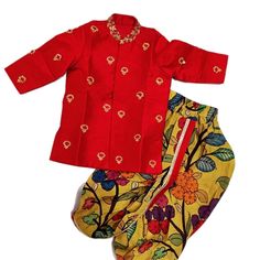 ❥ Handmade Designer stitched dhoti for kids boys; ❥ Size (12 Months to 18 Months) - PREORDER ❥ we use very soft and comfortable fabric . ❥ Sizes are approximate sizes and do have room to open for couple more inches ; All the sizes mentioned are standard baby size , we are not accountable for size mismatches for any reason ; Please do request us if you need more info before placing order as we CAN NOT ACCEPT RETURNS FOR KIDS CLOTHING ONES SOLD . ❀❀ Return / Exchange Policy :  ※ No Return/ No Exchange / No Cancellation! ※We need proof of video while package is opening for considering any case of missing or damaged products ;  ※ We can not accept any returns , if video at the time of package opening is not provided by the client . ღ ღ Please be courteous and don't ask for negotiation on price Traditional Red Pant Set For Navratri, Bollywood Style Red Pant Set For Diwali, Red Bollywood Pant Set For Diwali, Traditional Red Pant Set With Resham Embroidery, Festive Cotton Bandhgala For Diwali, Cotton Bandhgala For Diwali Festivity, Cotton Bandhgala For Diwali, Traditional Cotton Bandhgala For Festive Occasions, Traditional Festive Pant Set With Dori Work