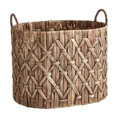 a woven basket is shown on a white background