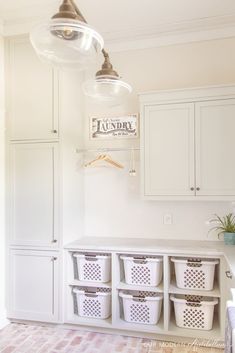 the laundry room is clean and ready to be used as a storage space for clothes